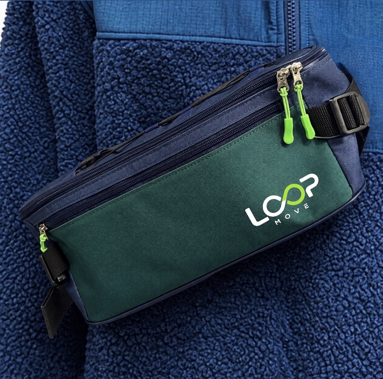 Riñonera original Loop Move azul y verde con logo LOOP MOVE y tiradores verdes